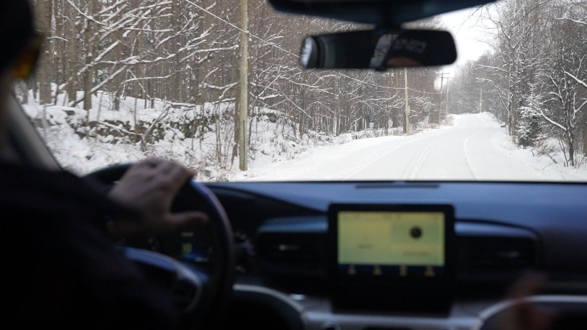 Sgt. Daniel Dubois patrols the border by car near Saint-Bernard-de-Lacolle, Que.