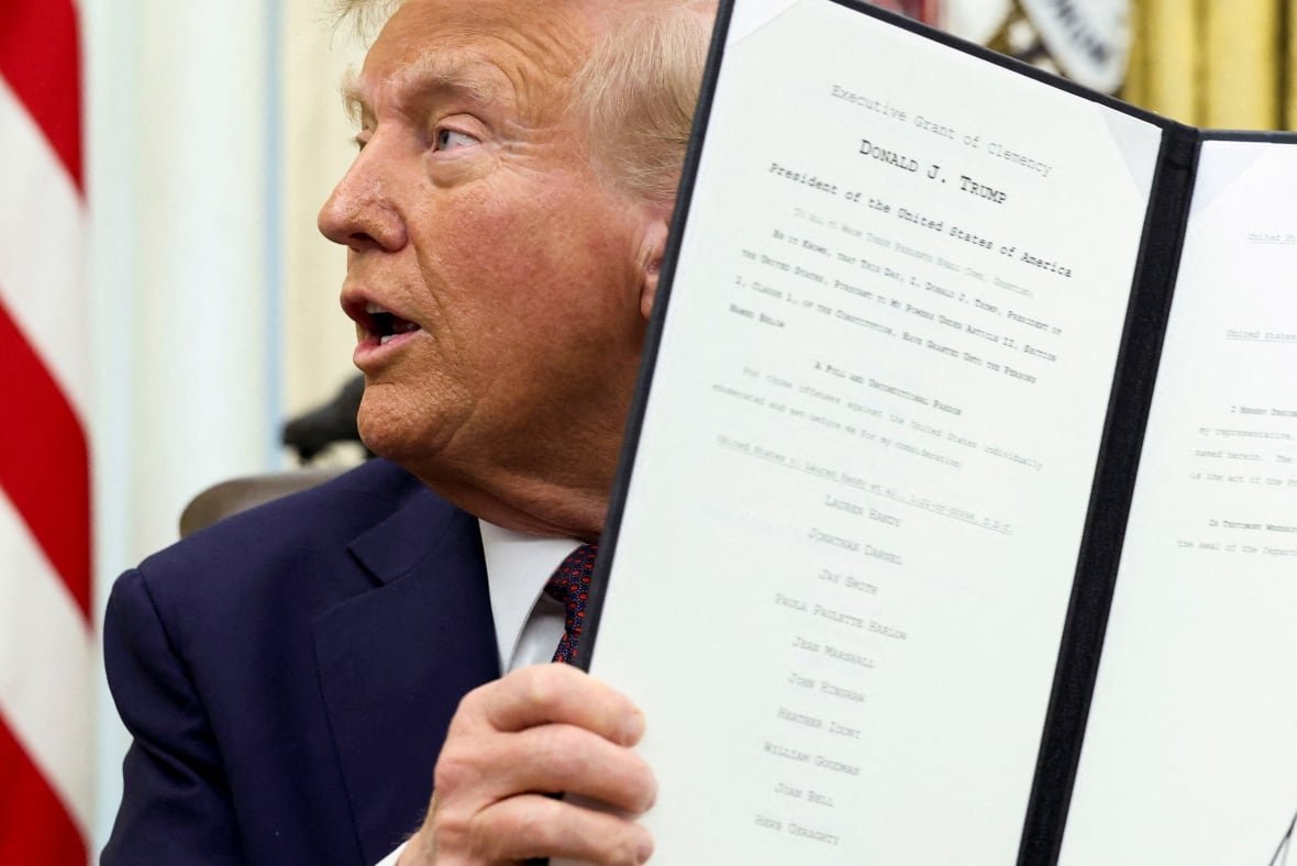 Trump holds up pardon papers