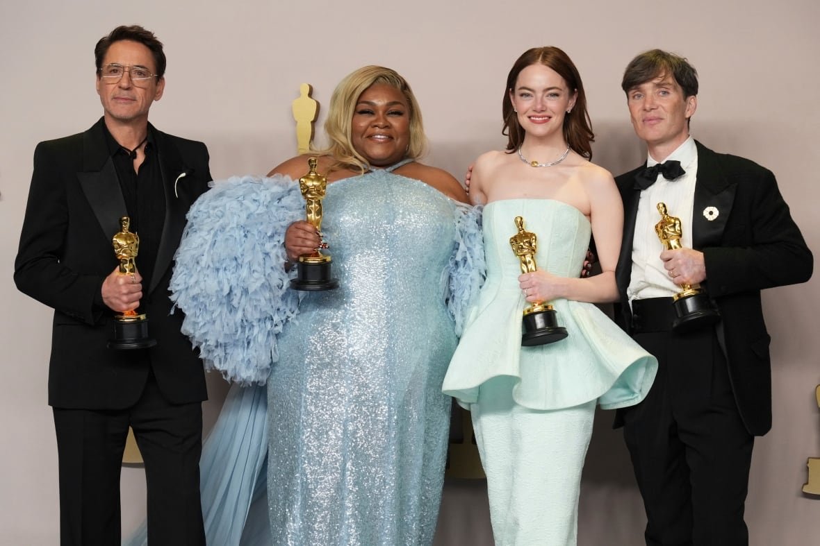 Oscar winners, from left, Robert Downey Jr., supporting actor for "Oppenheimer," Da'Vine Joy Randolph, supporting actress for "The Holdovers," Emma Stone, lead actress for "Poor Things," and Cillian Murphy, lead actor for "Oppenheimer," are seen posing.