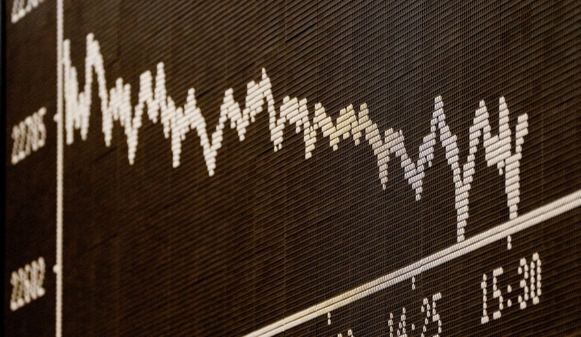 A digital graph is shown, with a line overall moving downwards. 