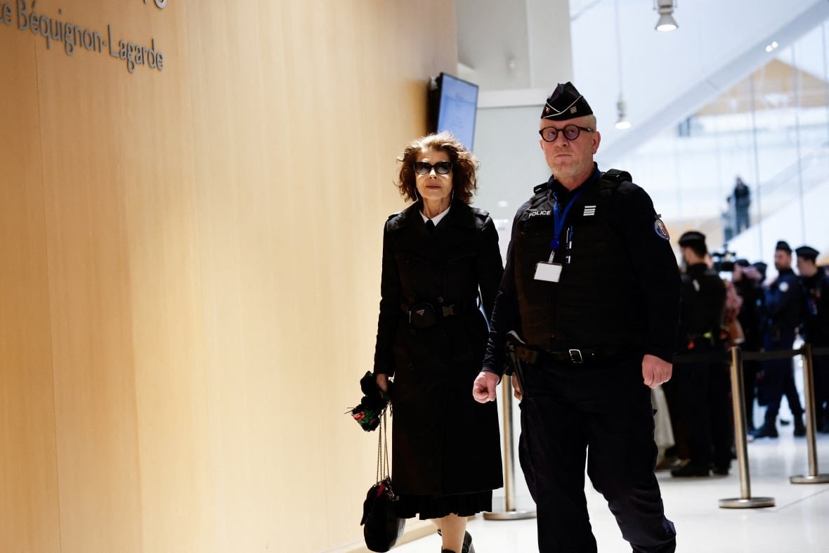 Actor Fanny Ardant walks on the day of French actor Gérard Depardieu's trial for two sexual assaults allegedly committed on the set of the film "Les Volets Verts", at the courthouse in Paris, France, March 24, 2025. 