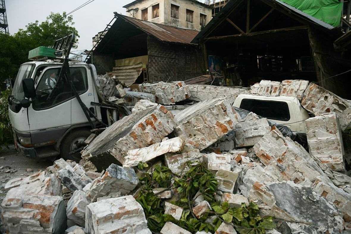 Blocks of concrete cover two vehicles.