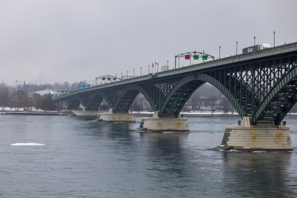Vehicles drive across the Peace Bridge between the United States and Canada, Thursday, Feb. 27, 2025, in Buffalo, N.Y.