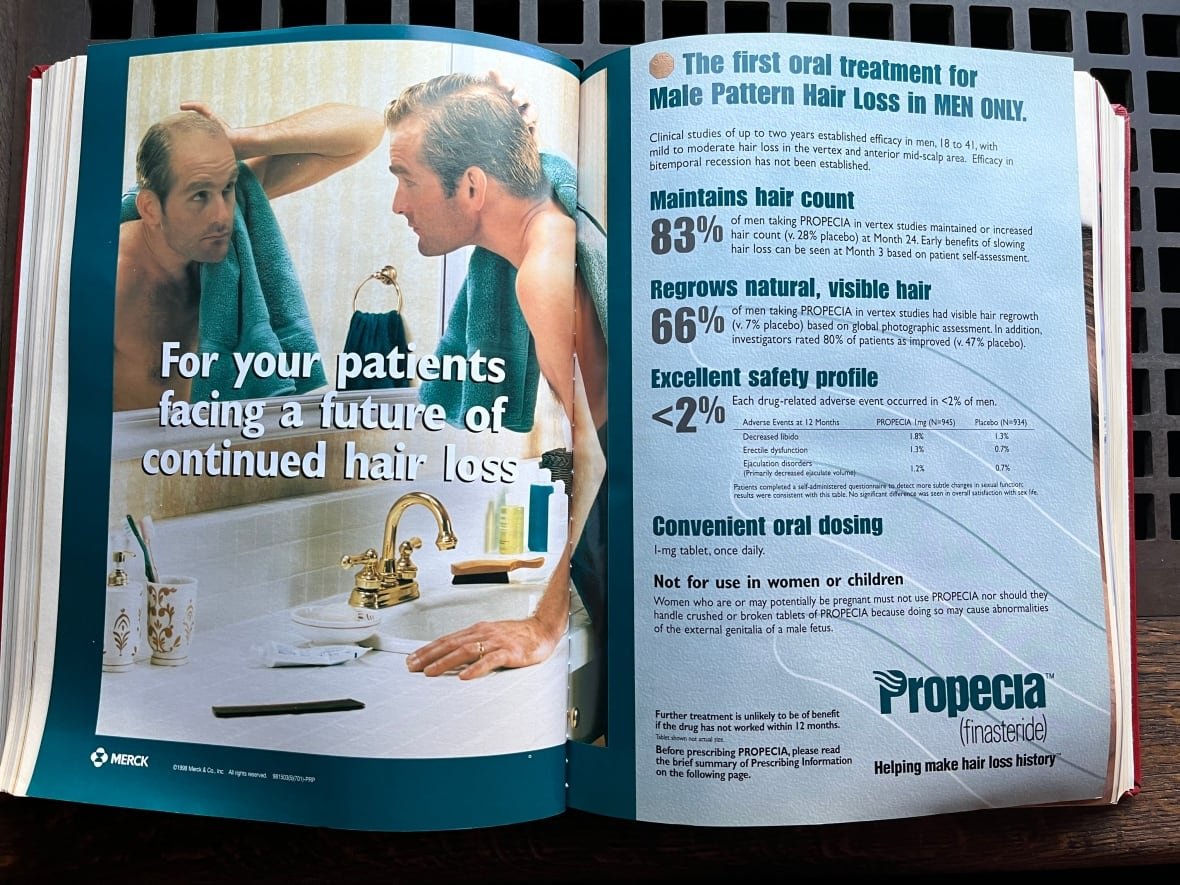 An advertisement in a journal regarding a drug for male hair loss.