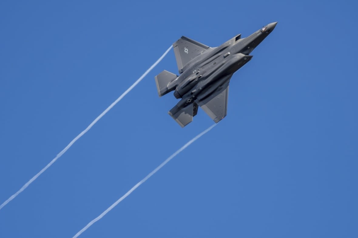 A U.S. F-35 fighter jet flies over the Eifel Mountains near Spangdahlem, Germany, Wednesday, Feb. 23, 2022. The U.S. Armed Forces moved stealth fighter jets to Spangdahlem Air Base a few days ago. The aircraft, built by the U.S. company Lockheed-Martin, is considered the most modern stealth fighter aircraft in the world.