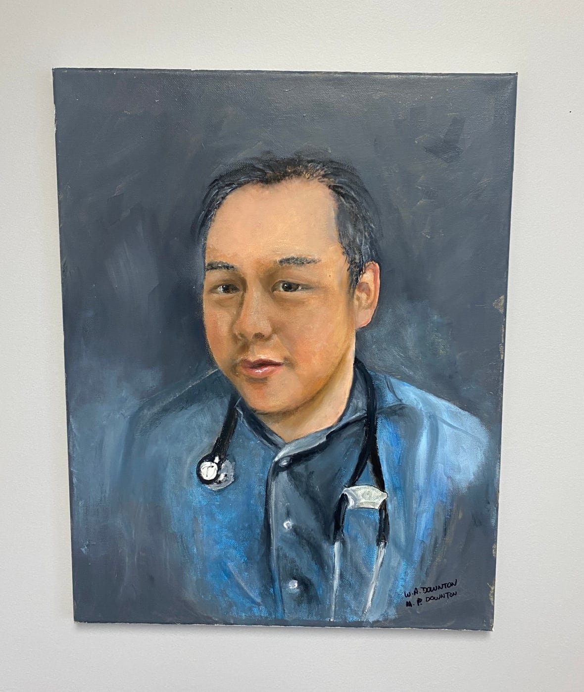 Painting of a doctor in a blue-collared shirt