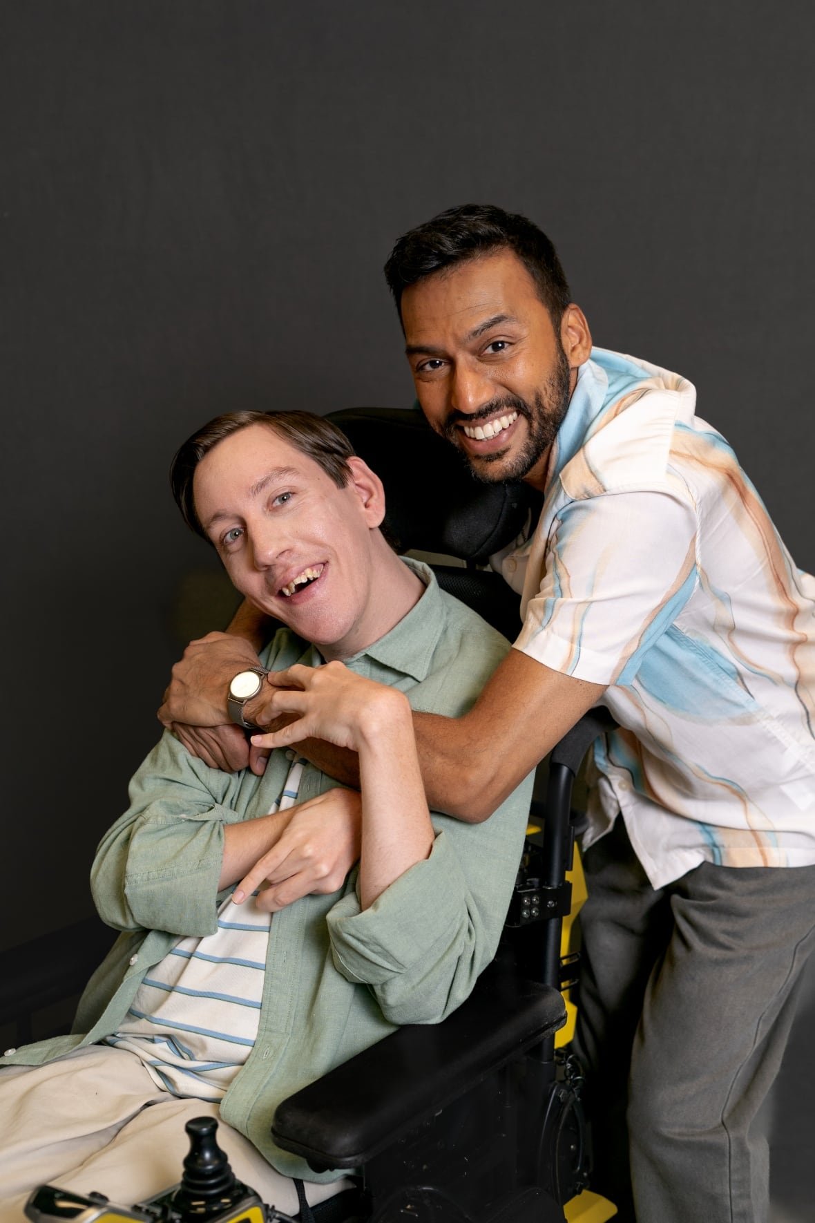 A picture of You're My Hero cast Sean Towgood and Vas Saranga.