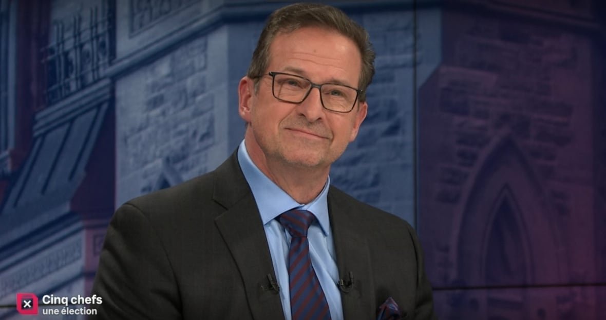 A man smiles