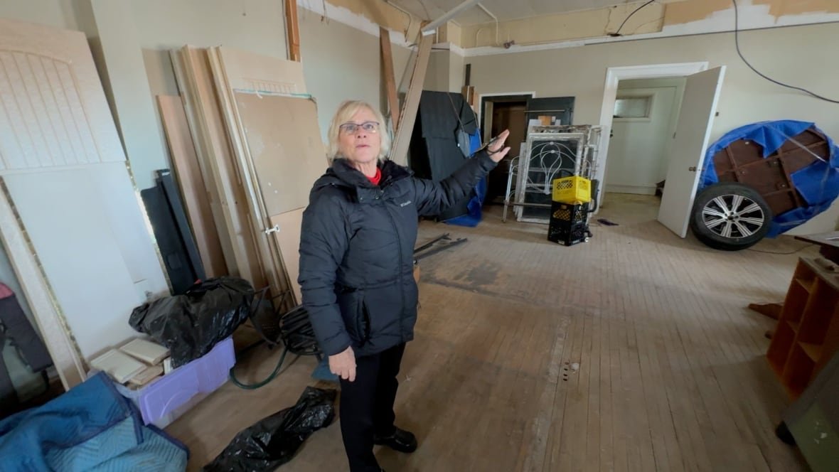 Sabina Wurz, is pictured inside the former town office in Granum, Alta. She plans to renovate the buidling into an artists' retreat.