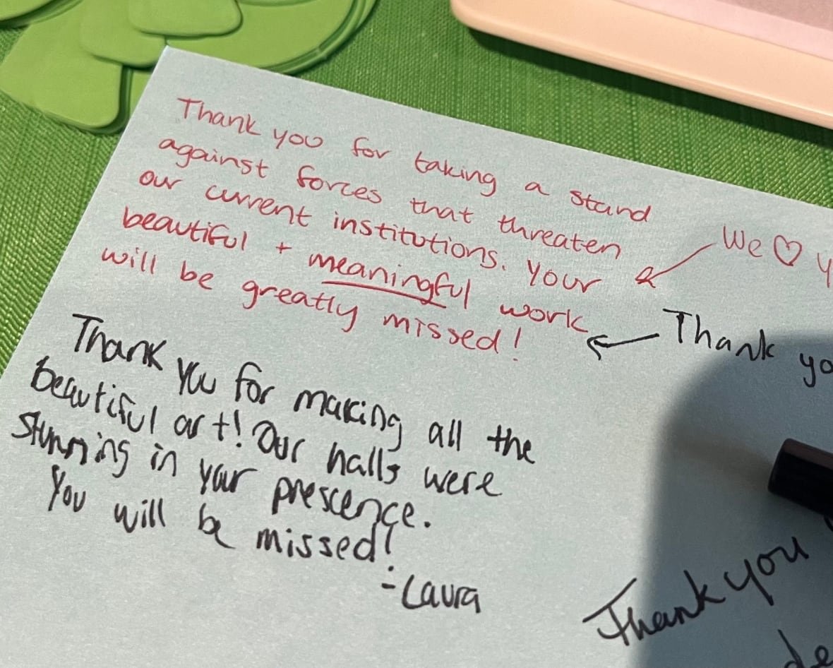 A thank-you card signed by various people. 