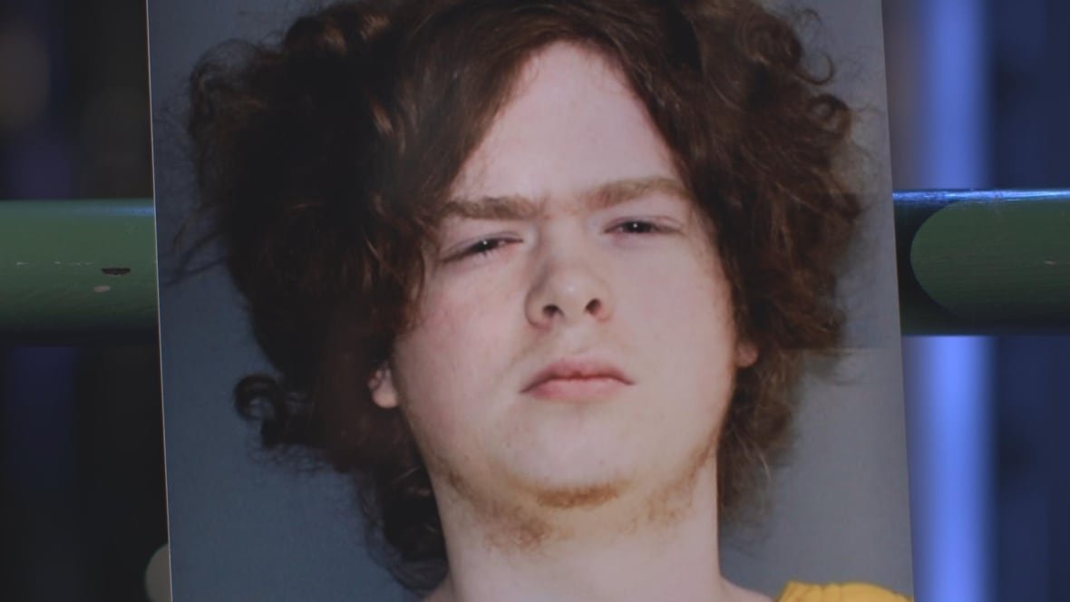 A police handout shows a picture of Bradley Cadenhead, who created 764 in 2020, after he was booked into jail.