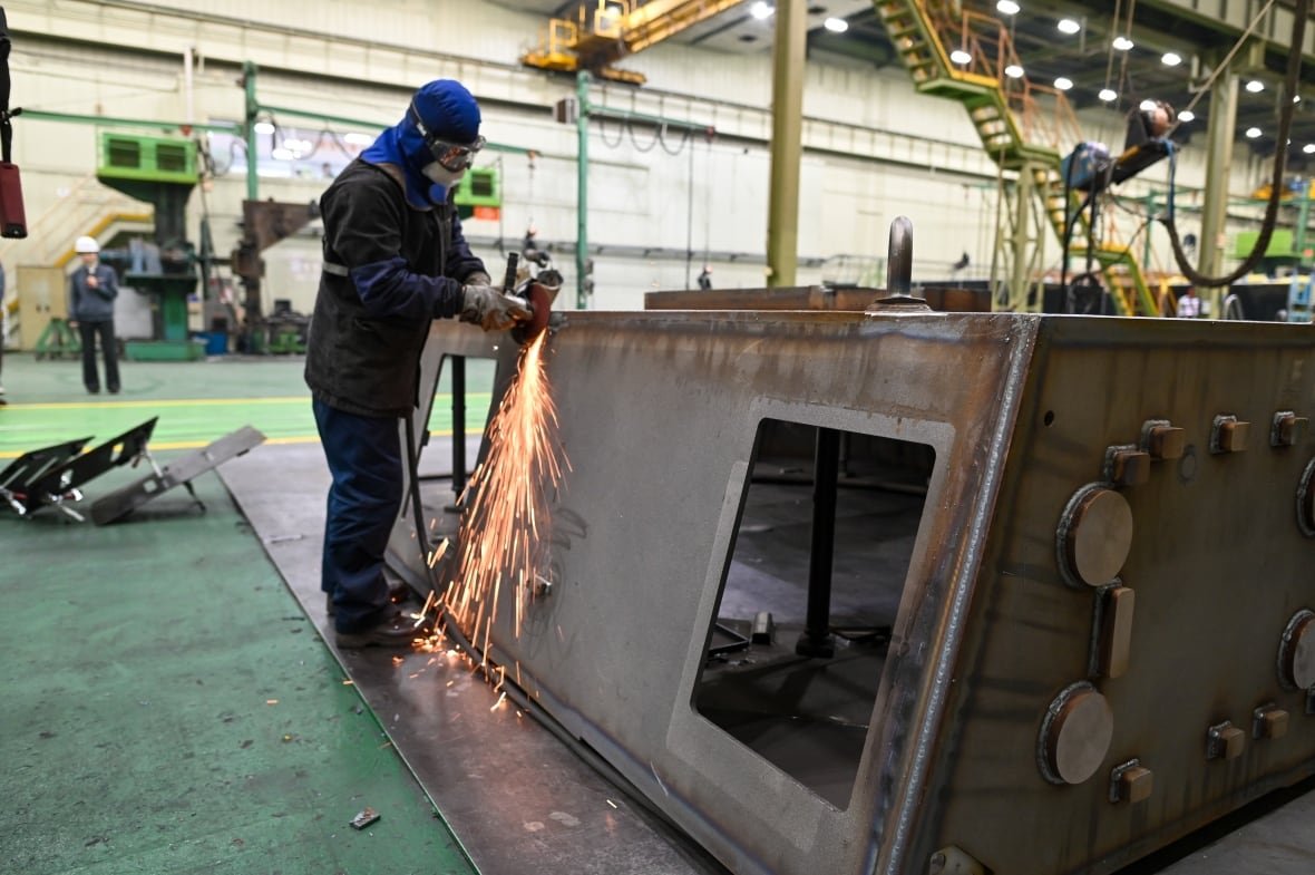 A worker at Hanwha Aerospace in Changwon, South Korea, machines the turret of a K-9 mobile howitzer. The company has pitched the federal government on a more than $1 billion plan to quickly equip the Canadian Army with the weapons system and other armoured vehicles. 
