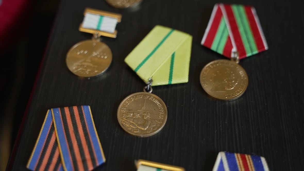Medals given to 98-year-old Ludmyla Varska are displayed in her apartment in Kyiv. She was given a medal for the "Defence of Leningrad" during the Second World War. 