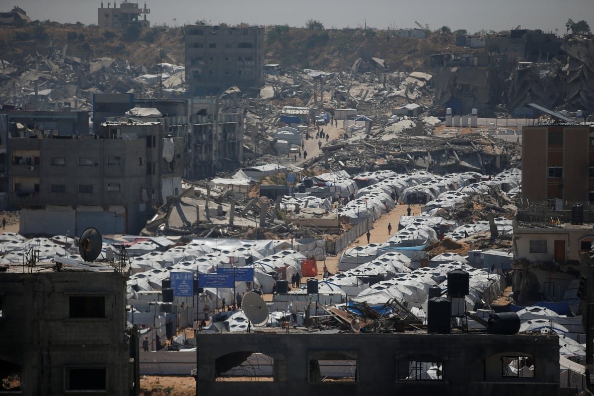 Palestinians displaced by the Israeli military offensive, shelter in tents near the rubble of houses in Jabalia refugee camp, in the northern Gaza Strip, May 8, 2025. 