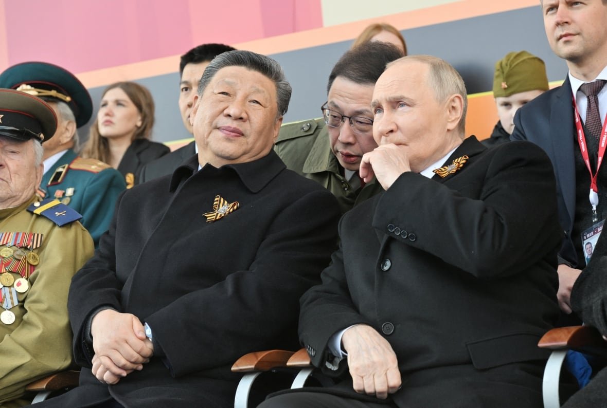 Russian President Vladimir Putin and his Chinese counterpart Xi Jinping attend a military parade on Victory Day, marking the 80th anniversary of the victory over Nazi Germany in World War Two, in Red Square in central Moscow, Russia, May 9, 2025. 