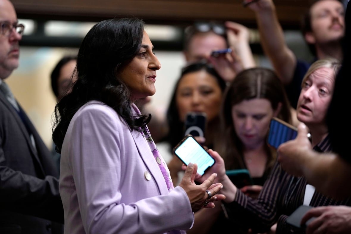 Minister of Foreign Affairs Anita Anand speaks to journalists as she arrives for a meeting of the federal cabinet in West Block on Parliament Hill in Ottawa on Wednesday, May 14, 2025.