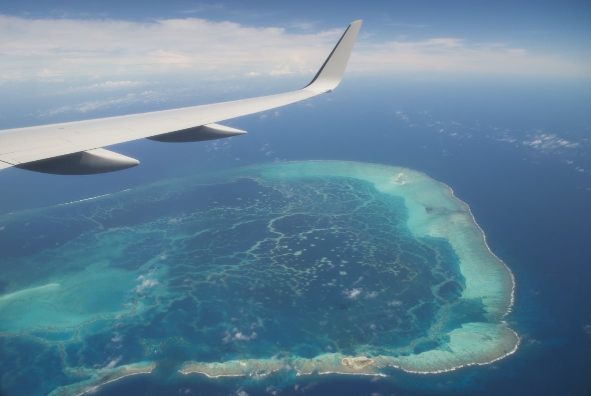 A view from a plane window of Midway Atoll in the Papahanaumokuakea Marine National Monument in the Pacific Ocean. 