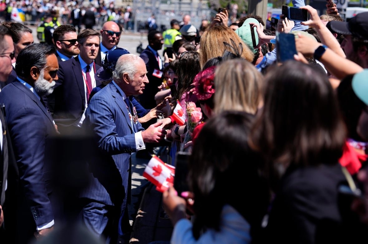 King Charles greets members of the public along Wellington Street, after the throne speech in the Senate, in Ottawa during a royal visit, on Tuesday, May 27, 2025.
