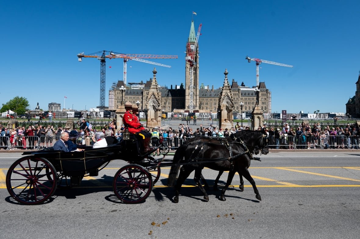 King Charles, Queen Camilla, Gov. Gen. Mary Simon and Whit Fraser husband to Governor General of Canada travel by Canada’s State Landau towards the Senate of Canada Building in Ottawa, on Tuesday, May 27, 2025.