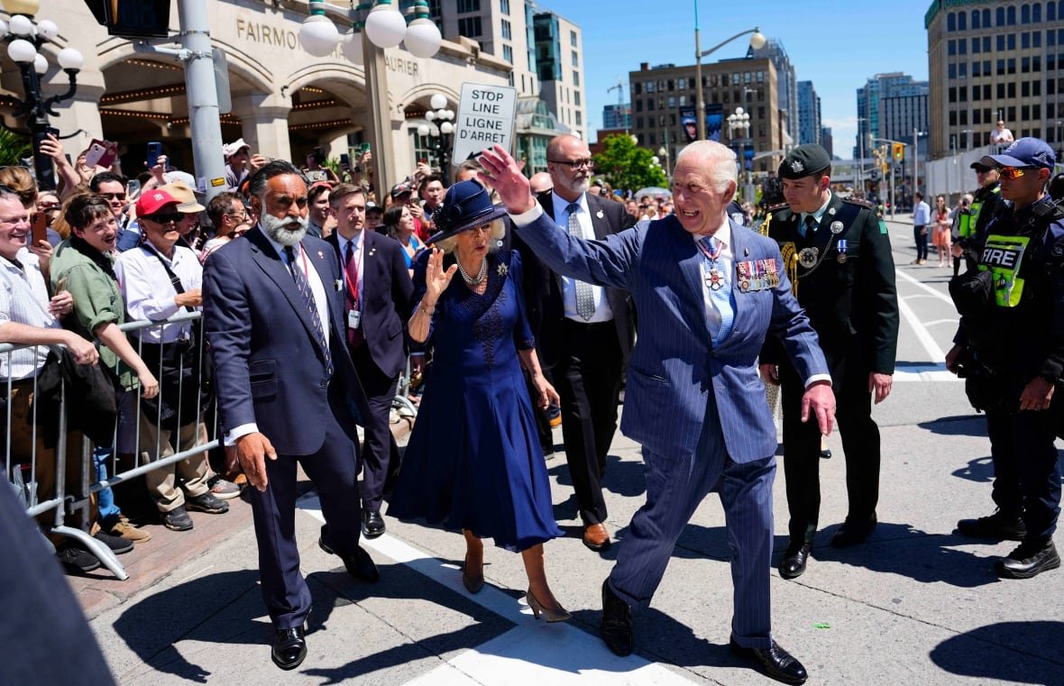 King Charles and Queen Camilla greet members of the public after the throne speech in the Senate in Ottawa during a royal visit on Tuesday, May 27, 2025.
