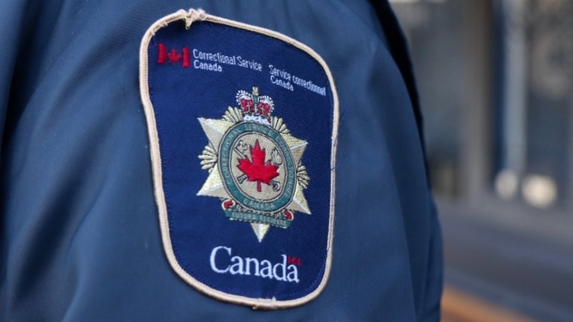 An up-close shot of a shoulder patch reading 'Correctional Services of Canada.'
