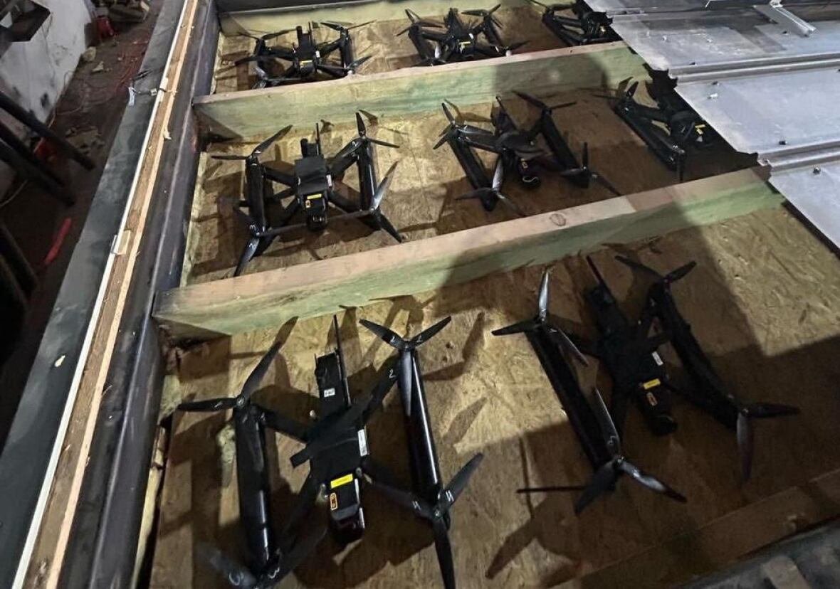 A photo released by Ukraine's security services purports to show quadcopter drones being concealed in wooded sheds ahead of June 1 attack. 