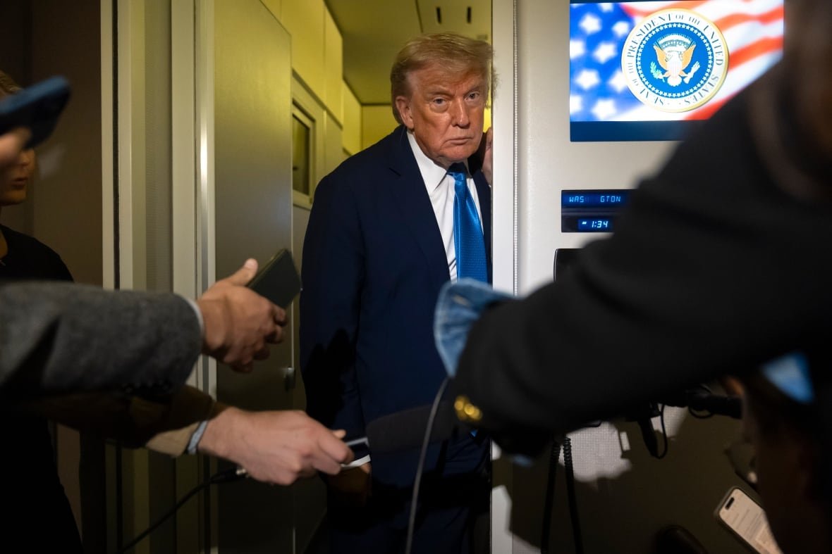President Donald Trump speaks with reporters while flying aboard Air Force One en route from Calgary, Canada to Joint Base Andrews, Md., late Monday, June 16, 2025.
