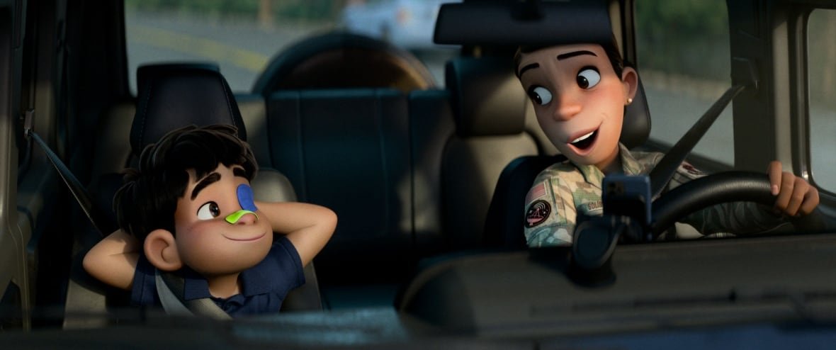 An animated image is shown. In it, smiling boy sits next to a smiling woman in a car.