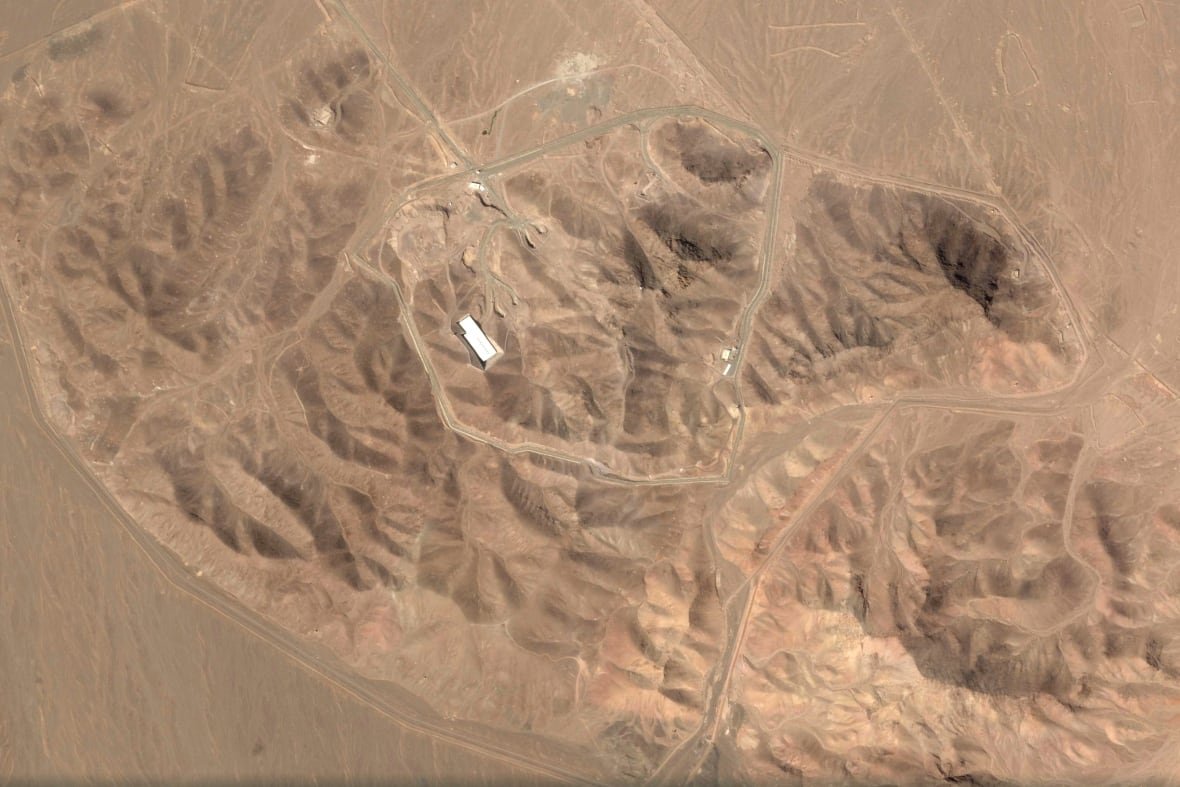 A satellite view shows facilities in the dessert.