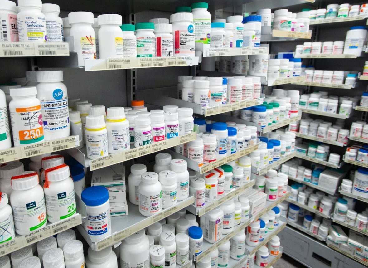 Prescription drugs are seen on shelves at a pharmacy in Montreal on March 11, 2021.