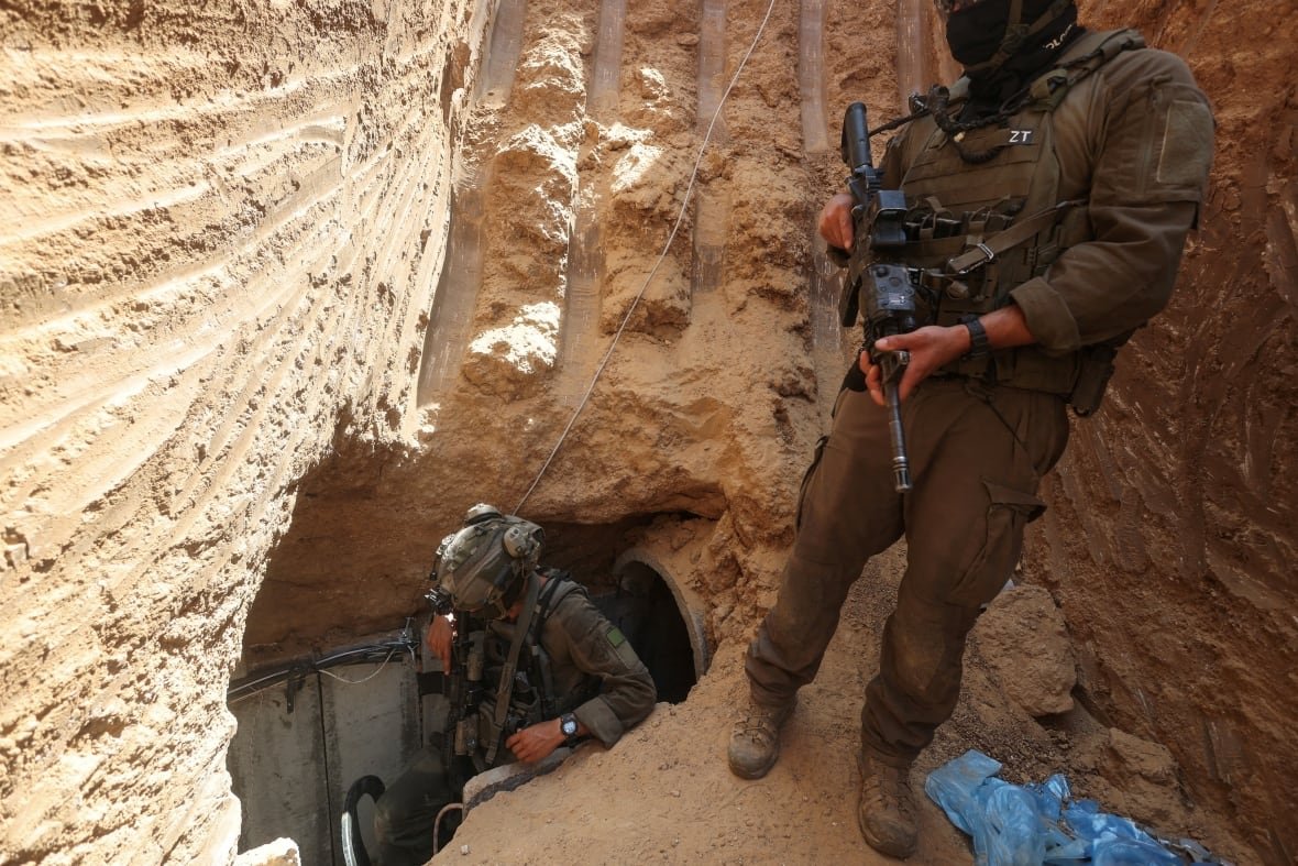 Israeli soldiers walk out from a tunnel underneath the European Hospital in Khan Younis at the Gaza Strip, amid the ongoing ground operation of the Israeli army against Palestinian Islamist group Hamas, June 8, 2025. 