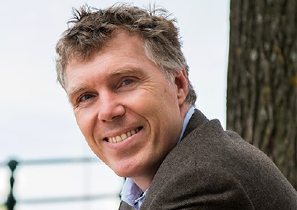 Smiling man Zeno Winkels, director of the Dutch Tenants Union, which negotiates with the government to set rent limits across the Netherlands.