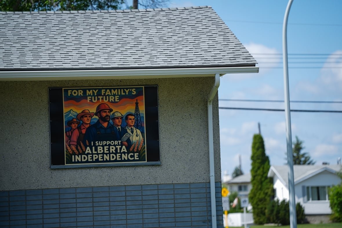 Artwork about Alberta independence is seen on the outside of a house in Edmonton on Sunday, June 15, 2025.