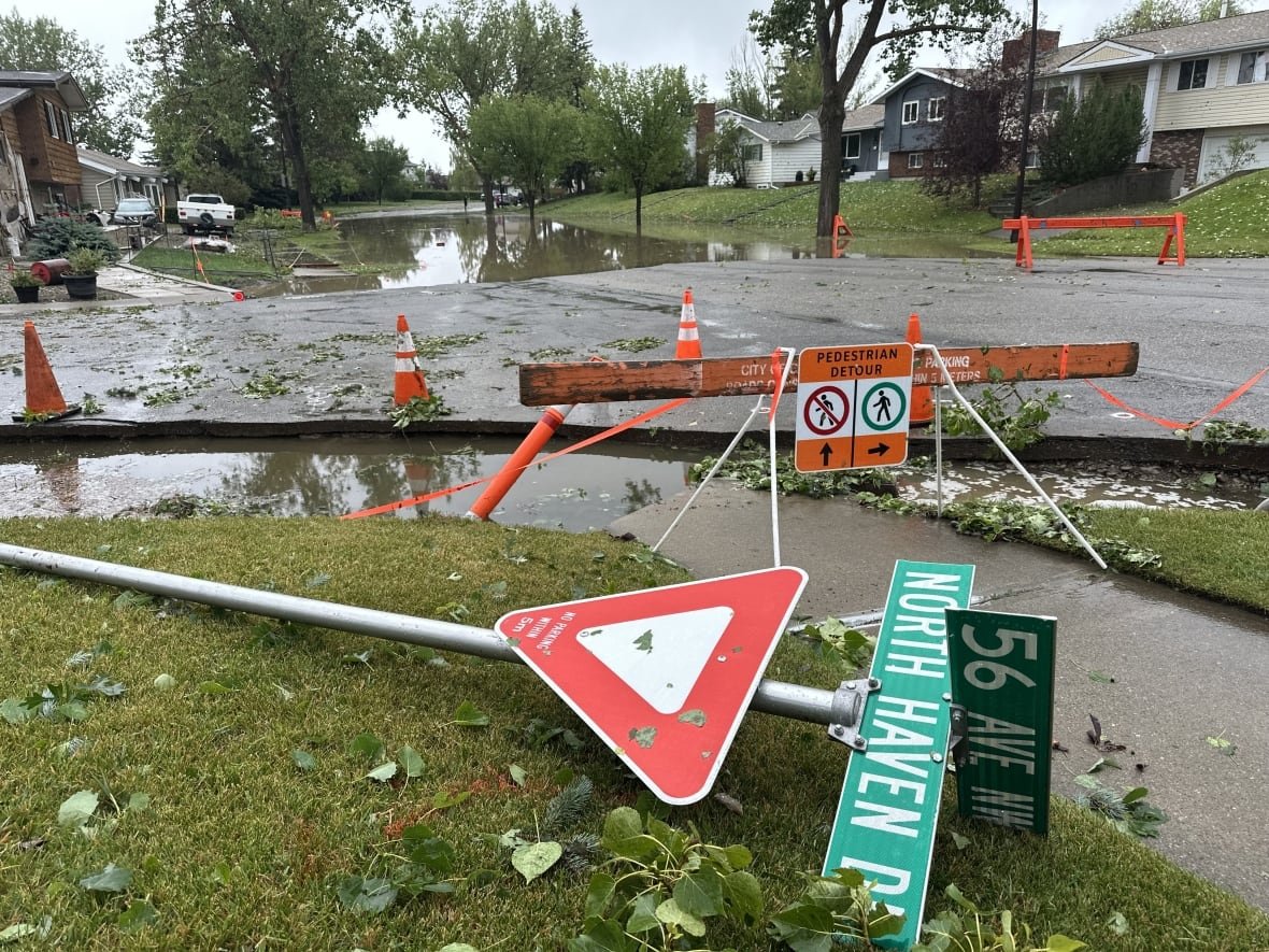 A yield sign on the ground.