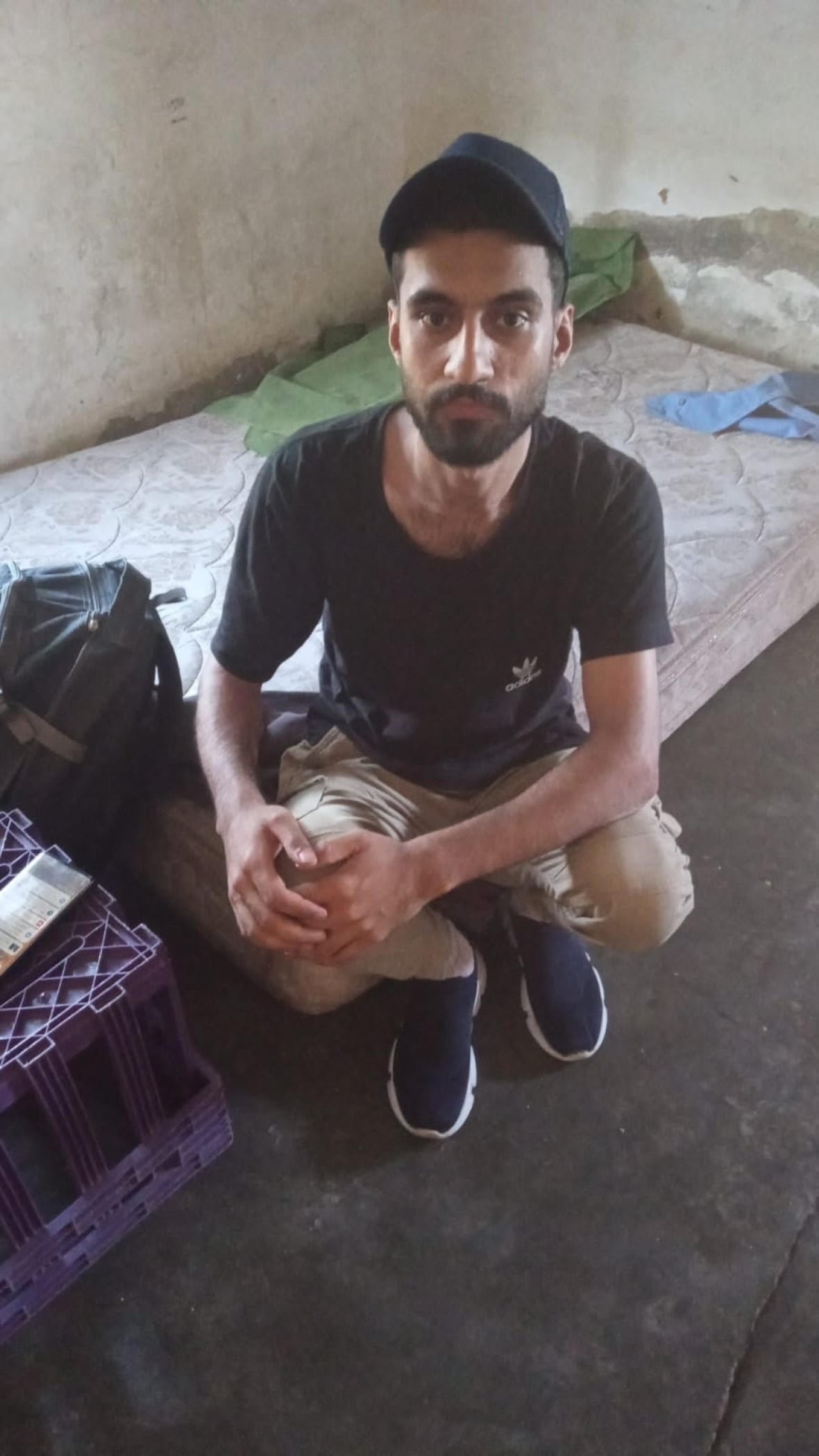 This photo of Mohammad Younesi was texted by his smugglers to his brother to prove he was alive and had made it to the U.S.-Mexico border.