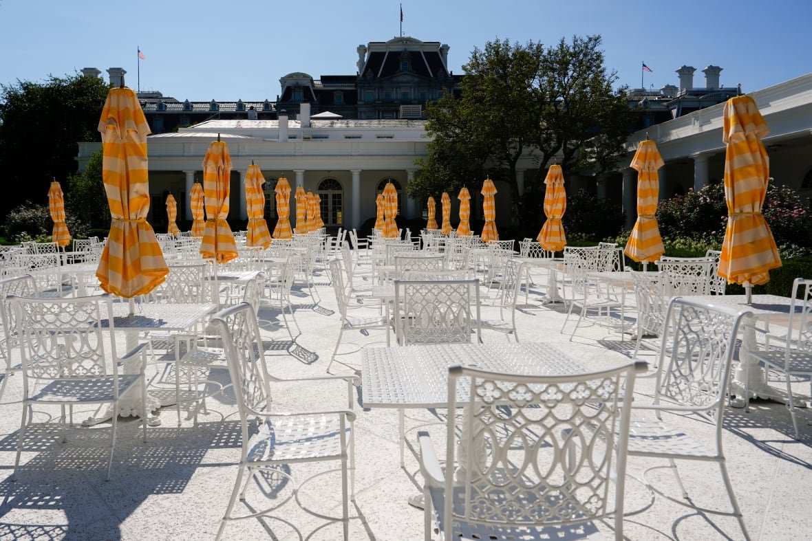 Tables and chairs stand in the newly renovated Rose Garden of the White House, Saturday, Aug. 9, 2025, in Washington.