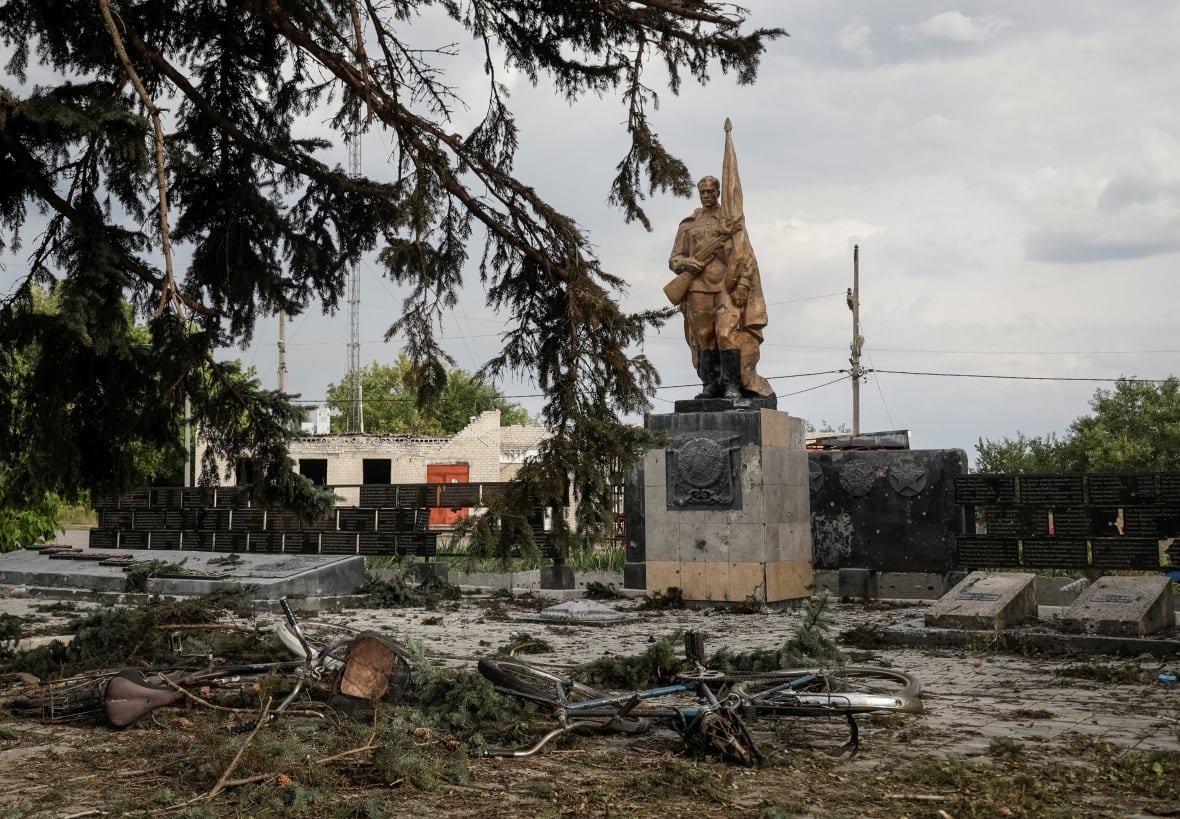A damaged bicycle and debris lie on the ground following a Russian air strike that killed several civilians at a pension disbursal point, officials said on Tuesday, amid Russia's attack on Ukraine, in the village of Yarova in Donetsk region, Ukraine September 9, 