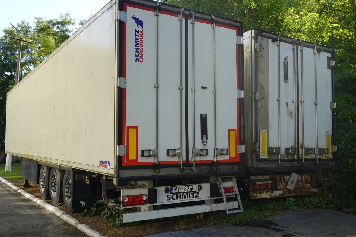 Refrigerated trucks contain the remains of Ukrainian soldiers waiting to be identified and returned to their families near a morgue in the eastern city of Dnipro.