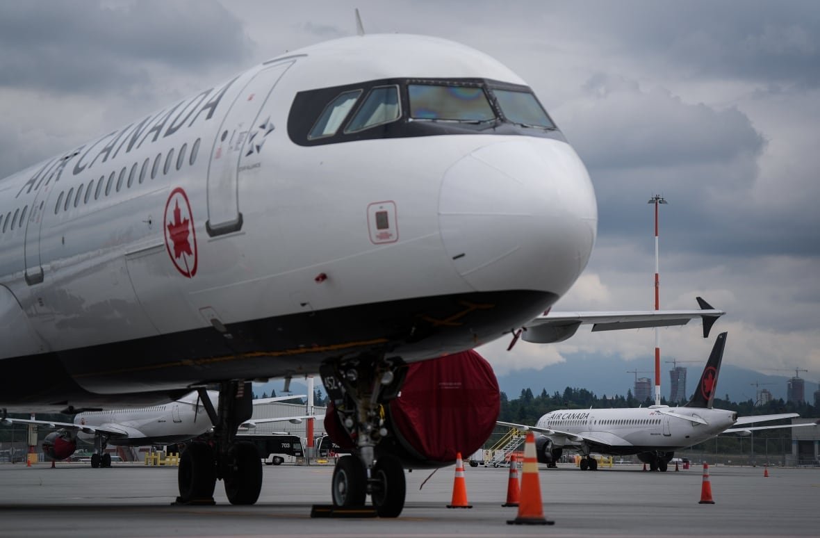 A plane is shown on the tarmac.