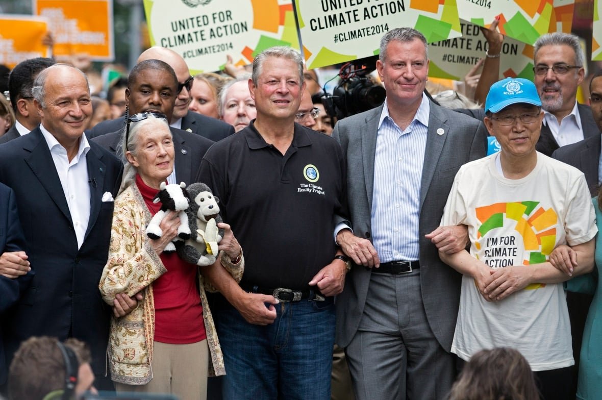 French Foreign Minister Laurent Fabius, from left, primatologist Jane Goodall, former U.S. Vice President Al Gore, New York Mayor Bill de Blasio, and U.N. Secretary General Ban Ki-moon participate in the People's Climate March in New York, Sunday, Sept. 21, 2014. Thousands of demonstrators filled the streets of Manhattan on Sunday, accompanied by drumbeats, wearing costumes and carrying signs as they urged policy makers to take global action on climate change.