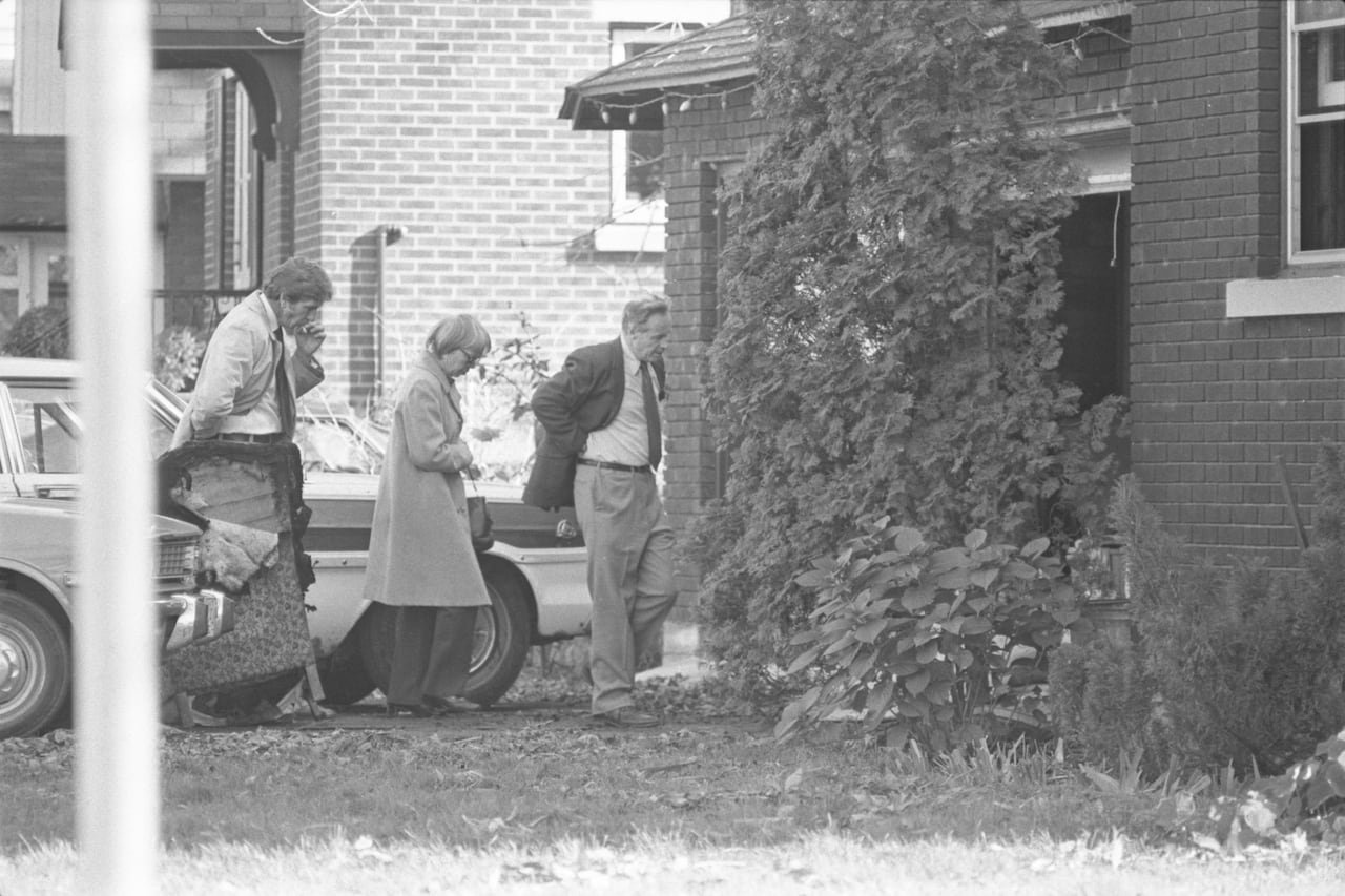 Robert Poulin's parents outside home