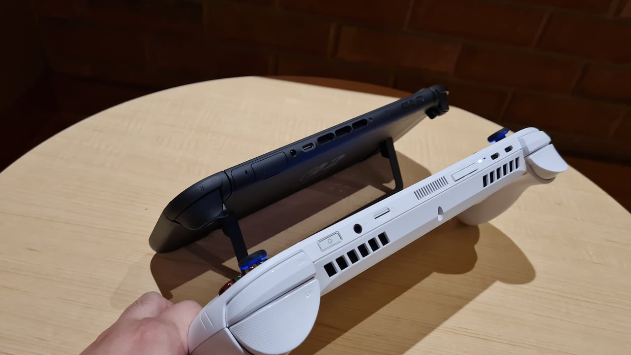 Photo of a Nintendo Switch 2 and Xbox ROG Ally portable gaming systems comparing their thickness.