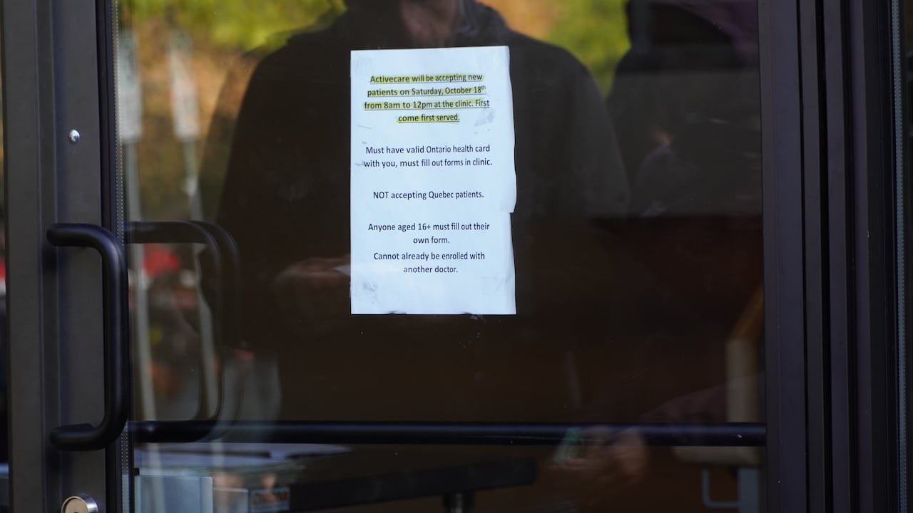 Paper posted on a door window.