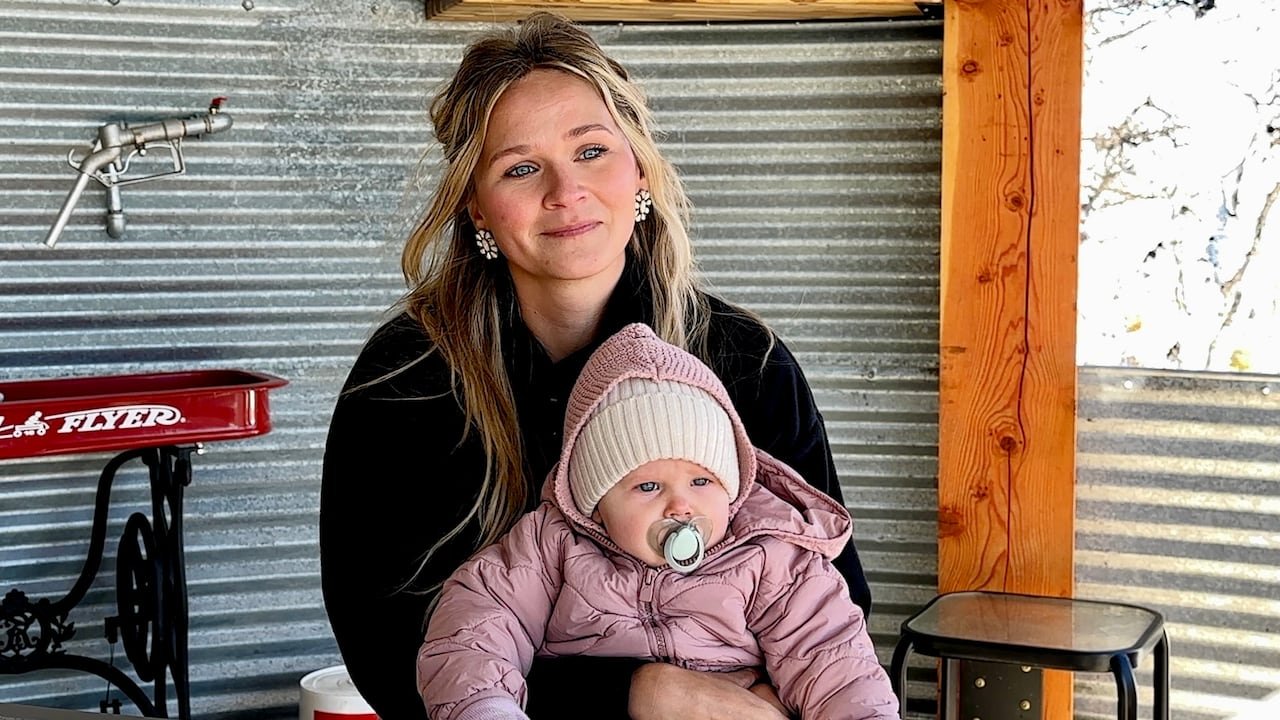 A mom and her baby are pictured inside a renovated grain bin.