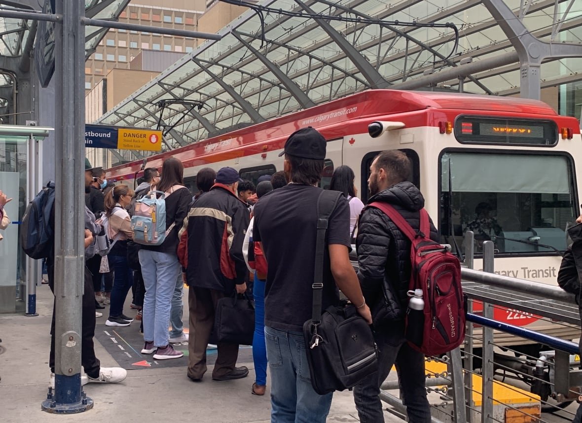 People crowded around a train